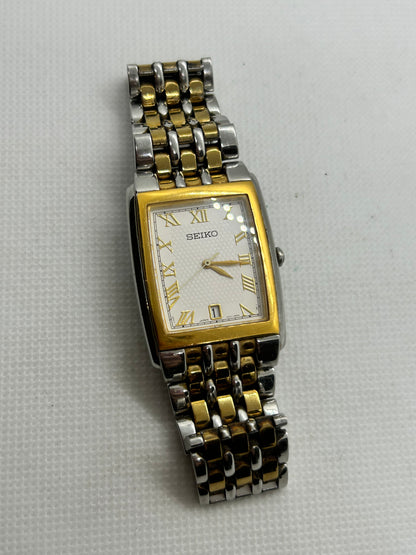 Seiko tank style quartz dress watch two tone silver and gold with date function