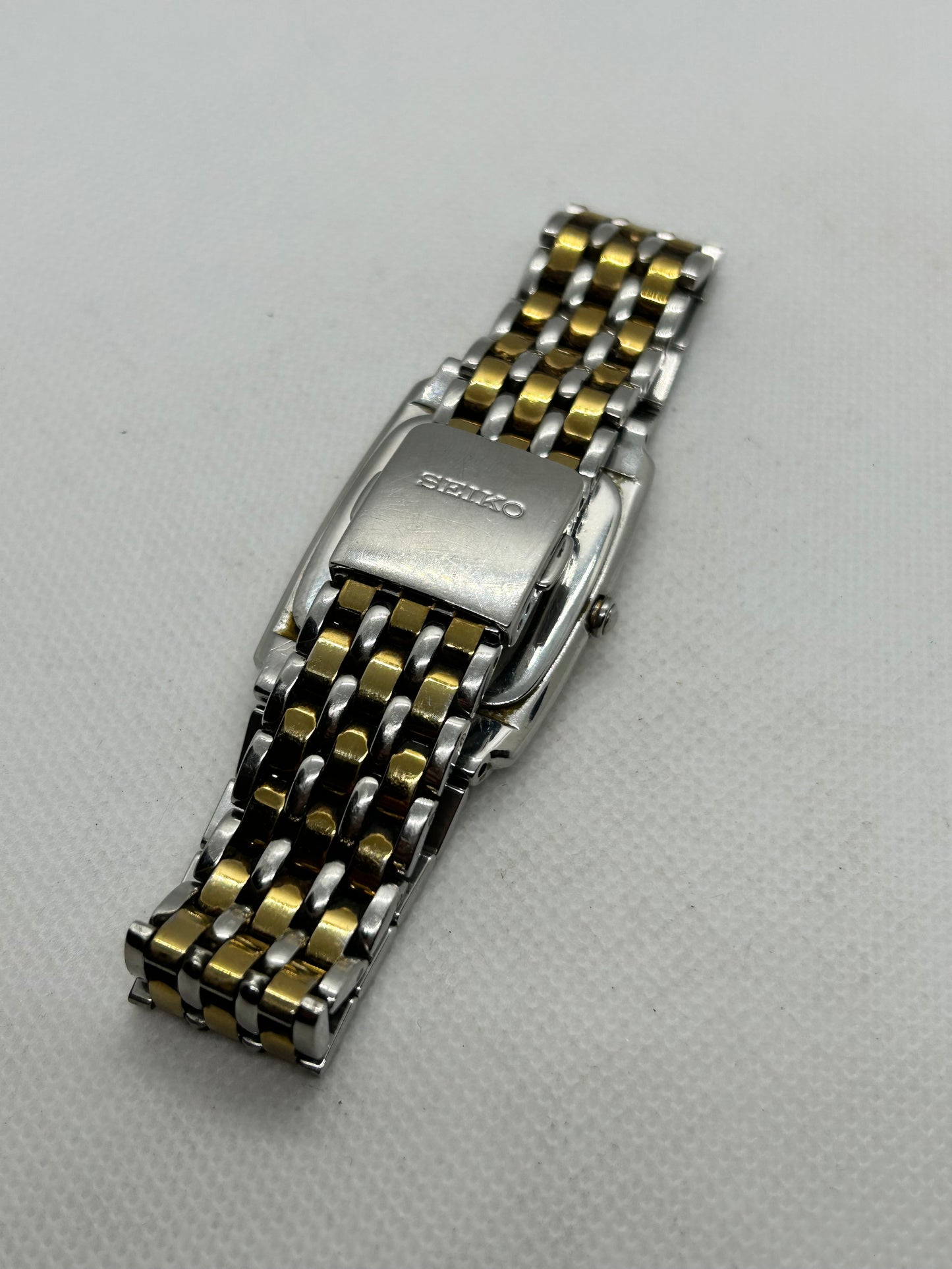 Seiko tank style quartz dress watch two tone silver and gold with date function