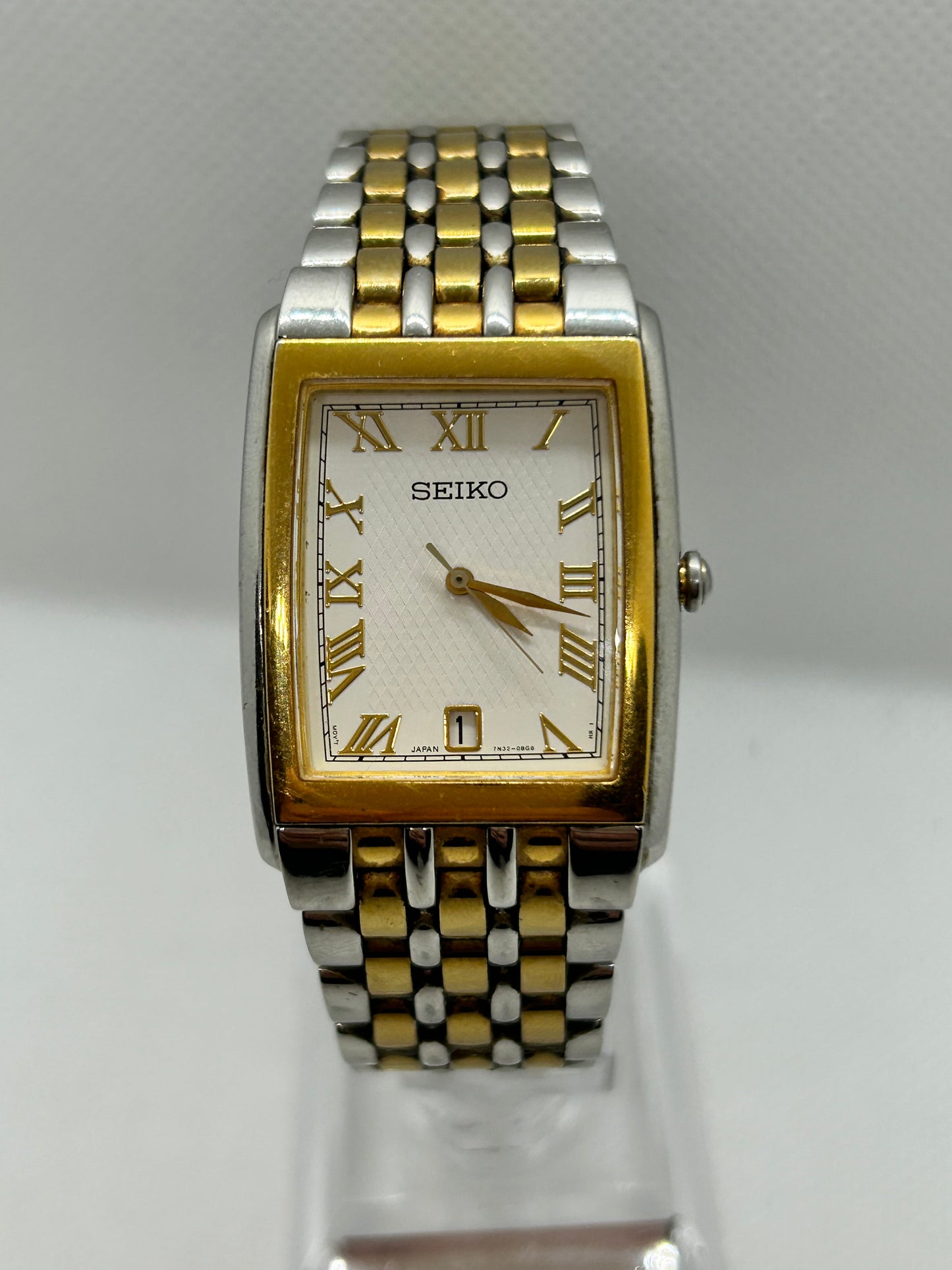 Seiko tank style quartz dress watch two tone silver and gold with date function