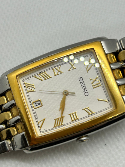 Seiko tank style quartz dress watch two tone silver and gold with date function