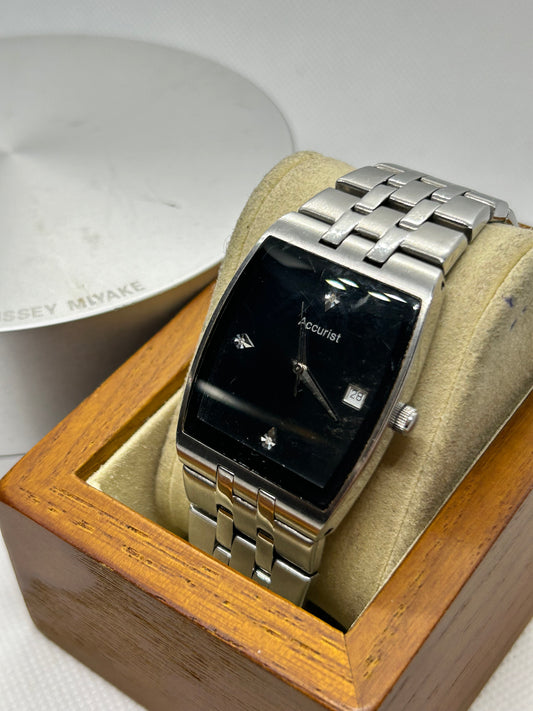 Accurist silver quartz watch with black dial, with box