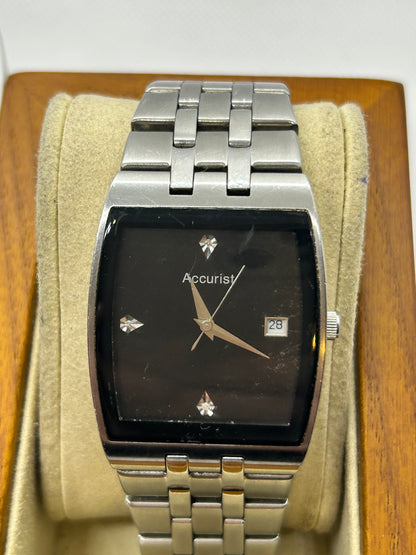 Accurist silver quartz watch with black dial, with box