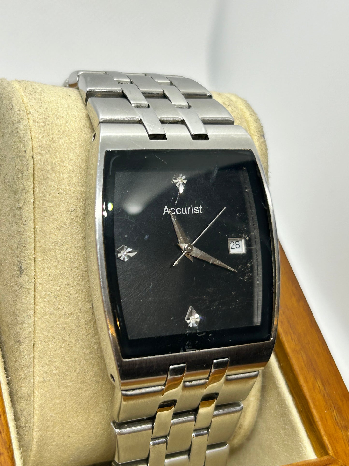 Accurist silver quartz watch with black dial, with box