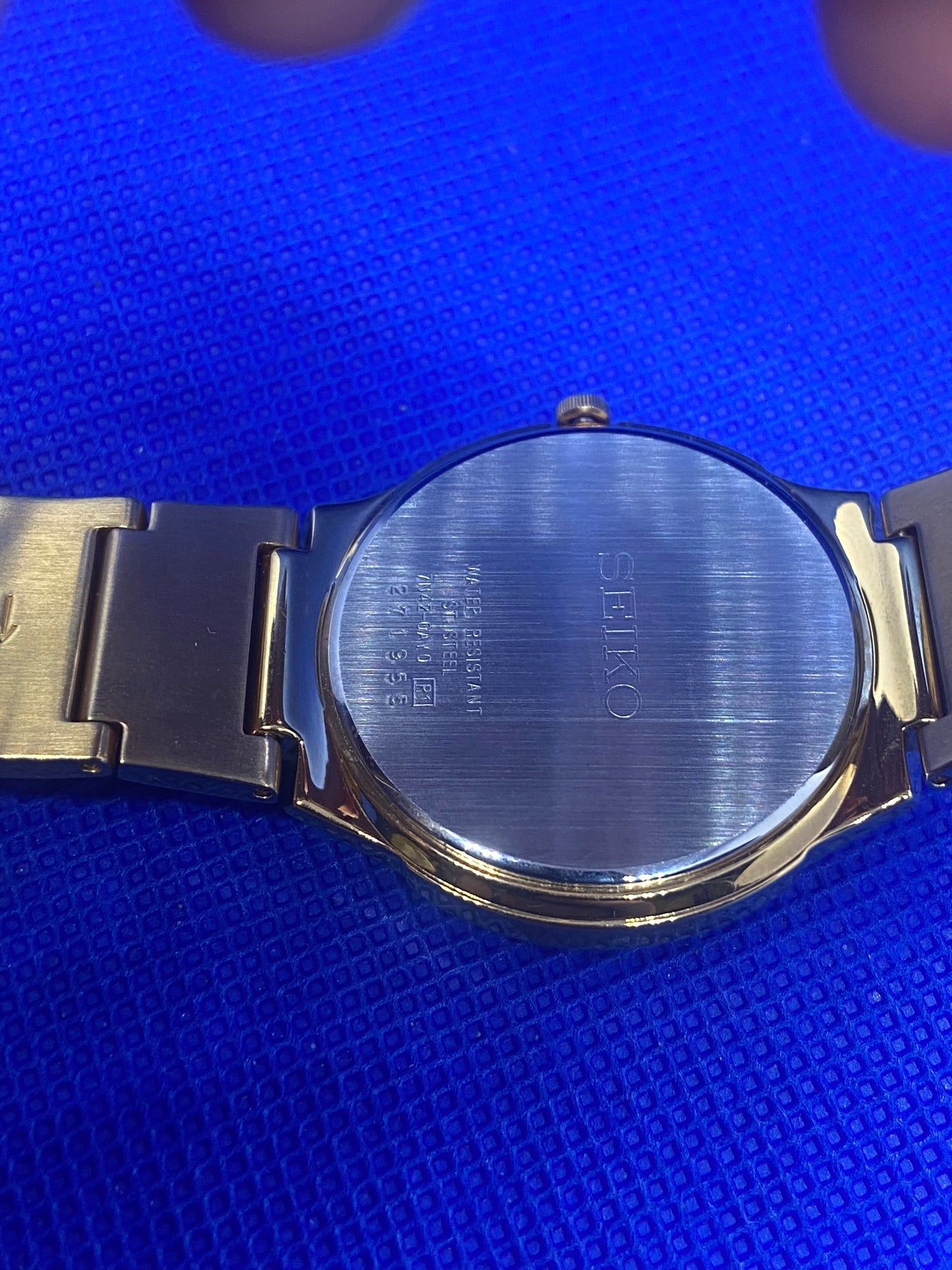 Seiko sports gold bracelet and dial with date function