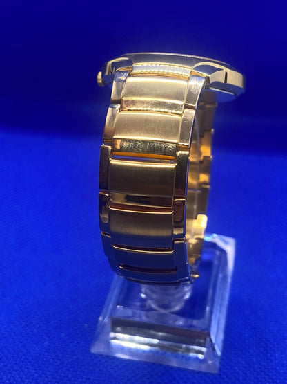 Seiko sports gold bracelet and dial with date function