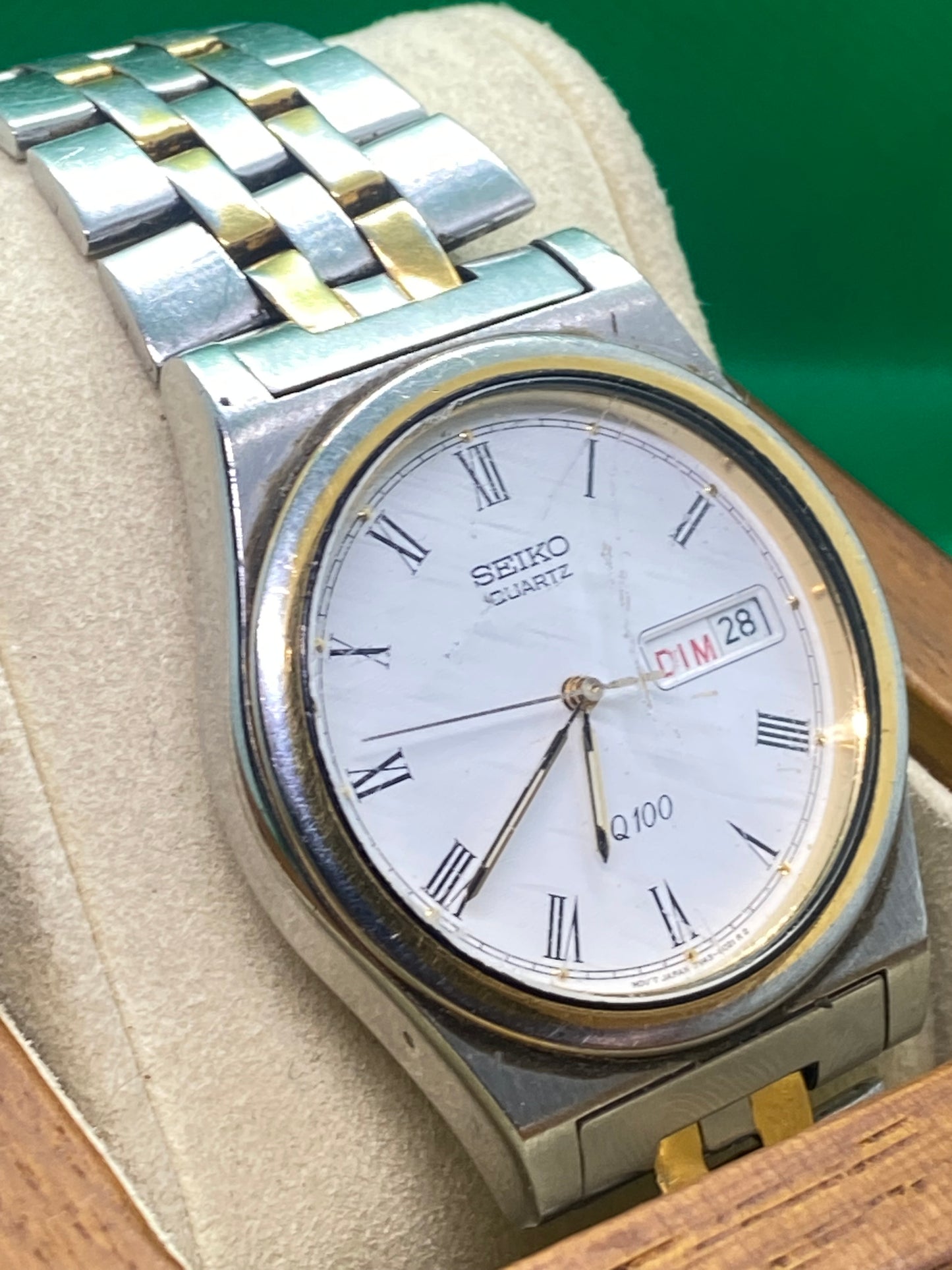 Seiko SQ100 quartz watch two tone day date watch