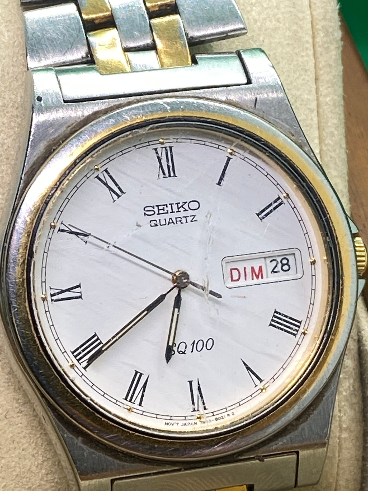 Seiko SQ100 quartz watch two tone day date watch