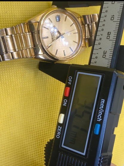 Seiko SQ quartz watch all gold with presidential style bracelet and date function