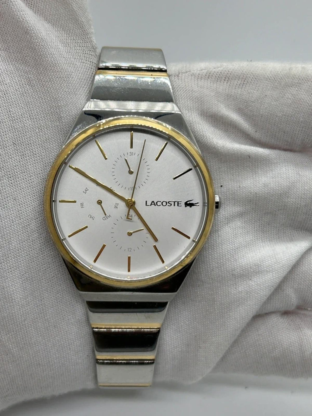 Ladies Lacoste silver and gold watch with box and papers