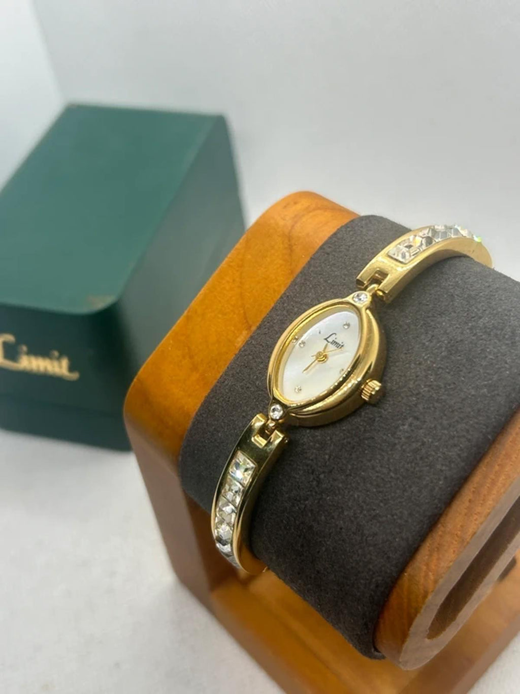Ladies limit gold cocktail dress watch silver dial with box and papers