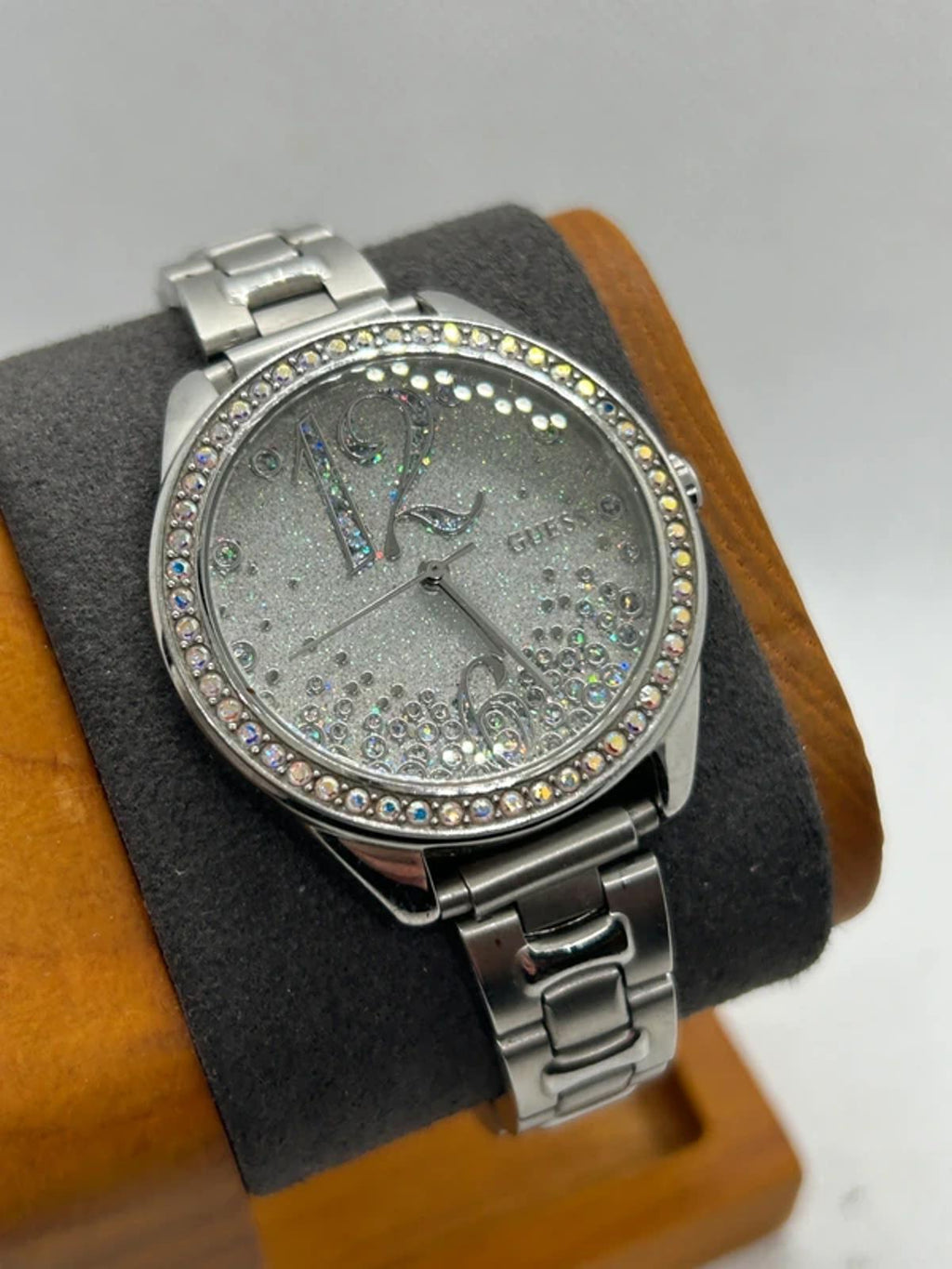 Ladies silver Guess watch diamanté bezel with silver dial and silver bracelet