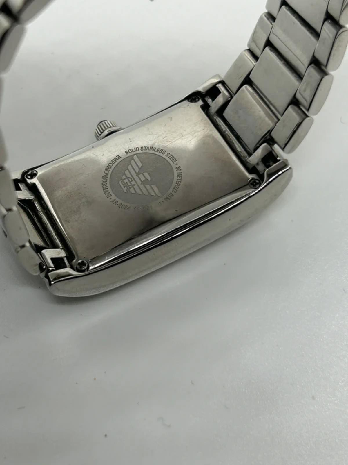Unisex sized Emporio Armani  silver and black watch box and spare links