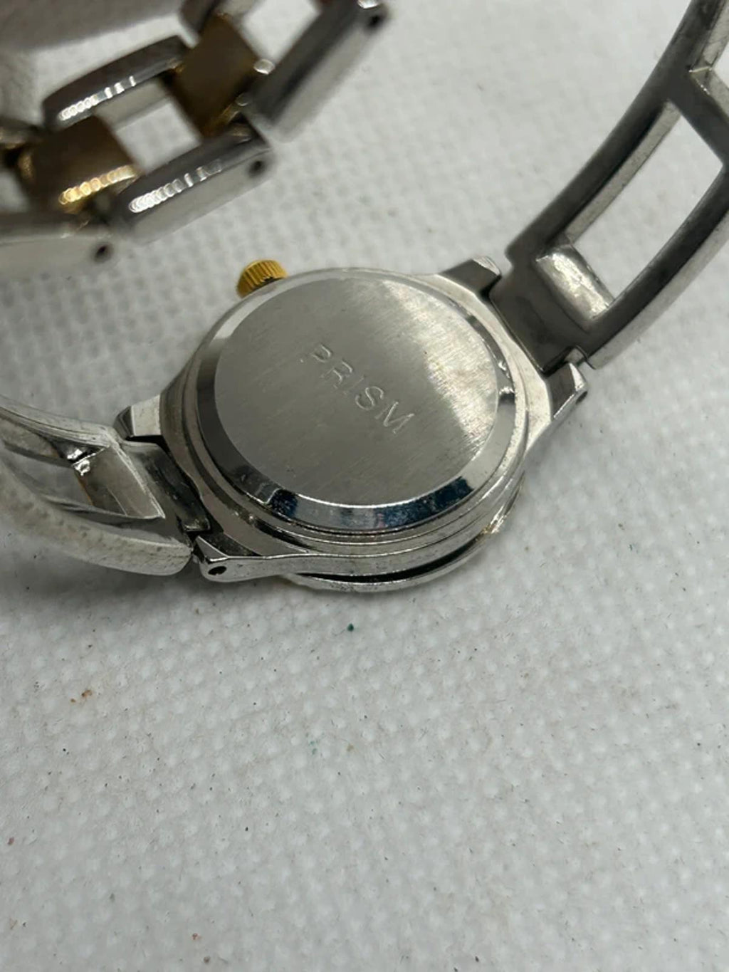 Ladies gold and silver Prism watch changeable bezel watch with box