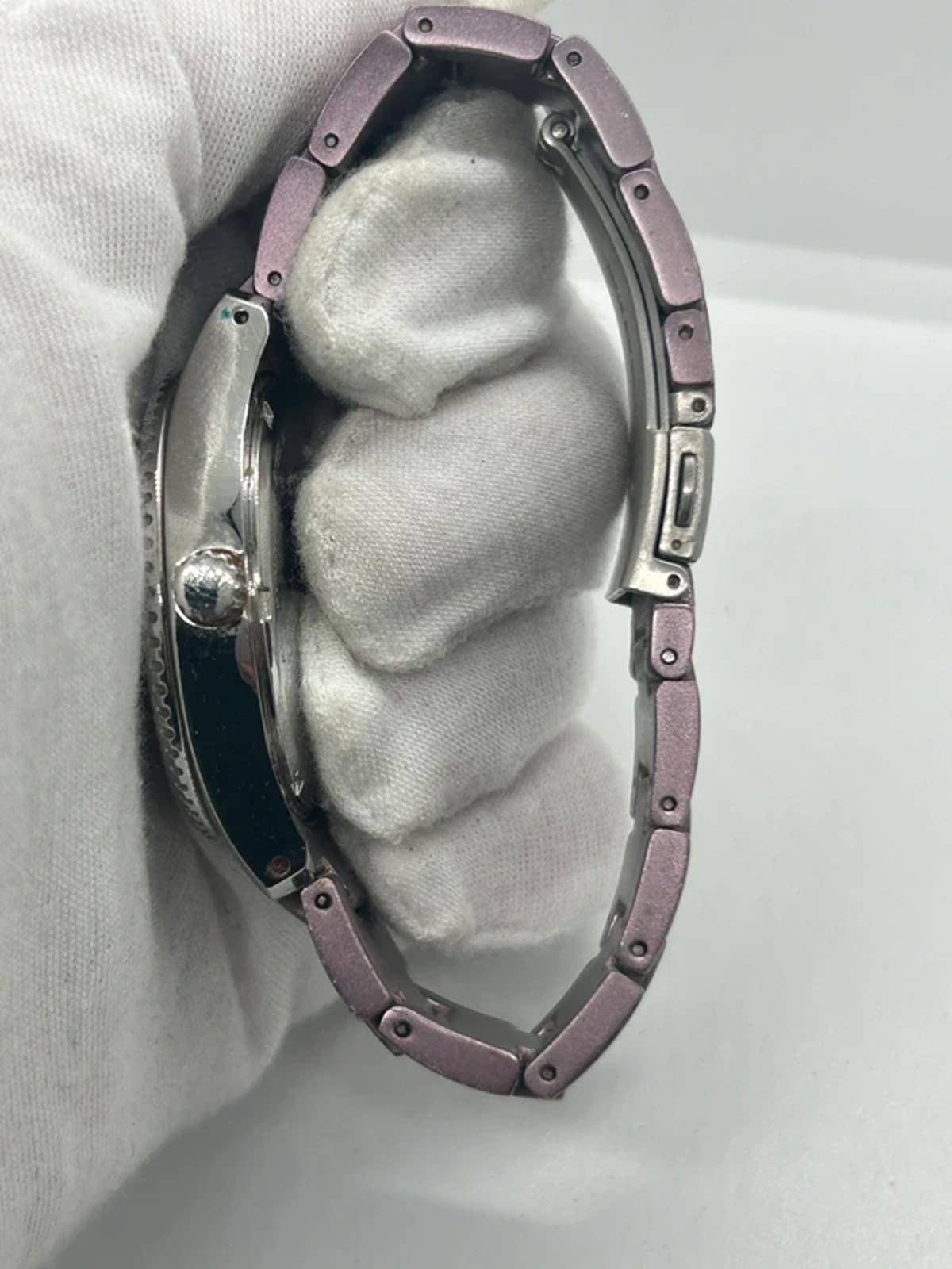 Ladies Lilac fossil quartz watch with gemstone bezel