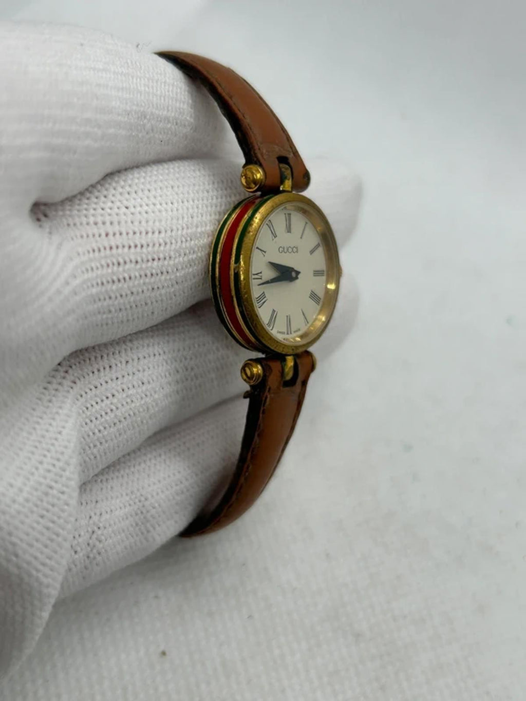 Vintage Gucci ladies watch with gold dial and red green case watch
