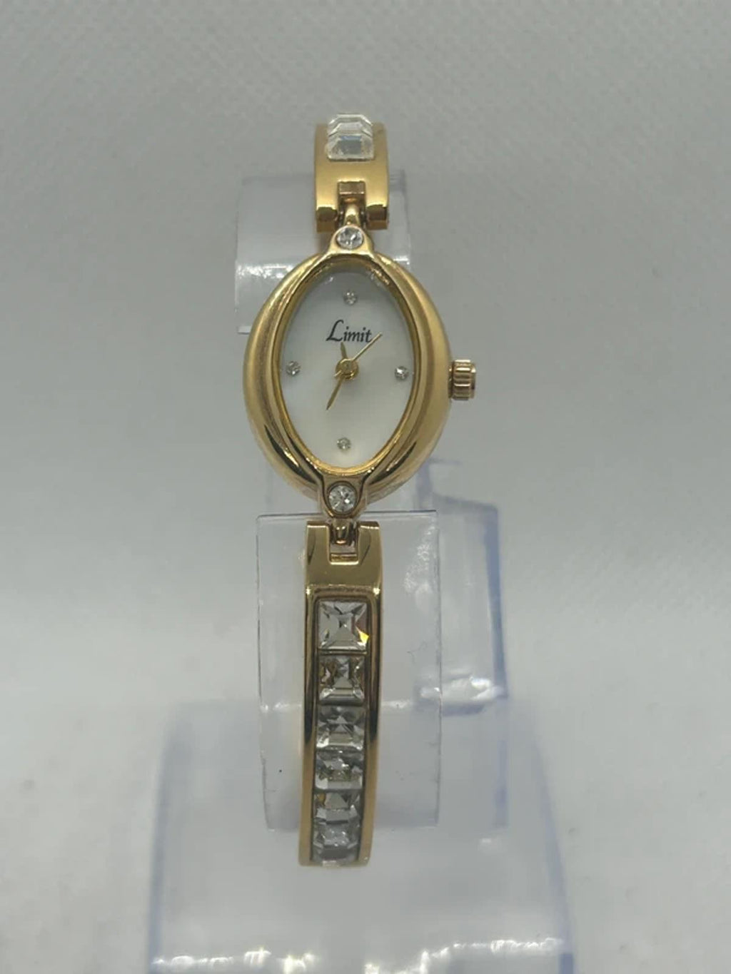 Ladies limit gold cocktail dress watch silver dial with box and papers