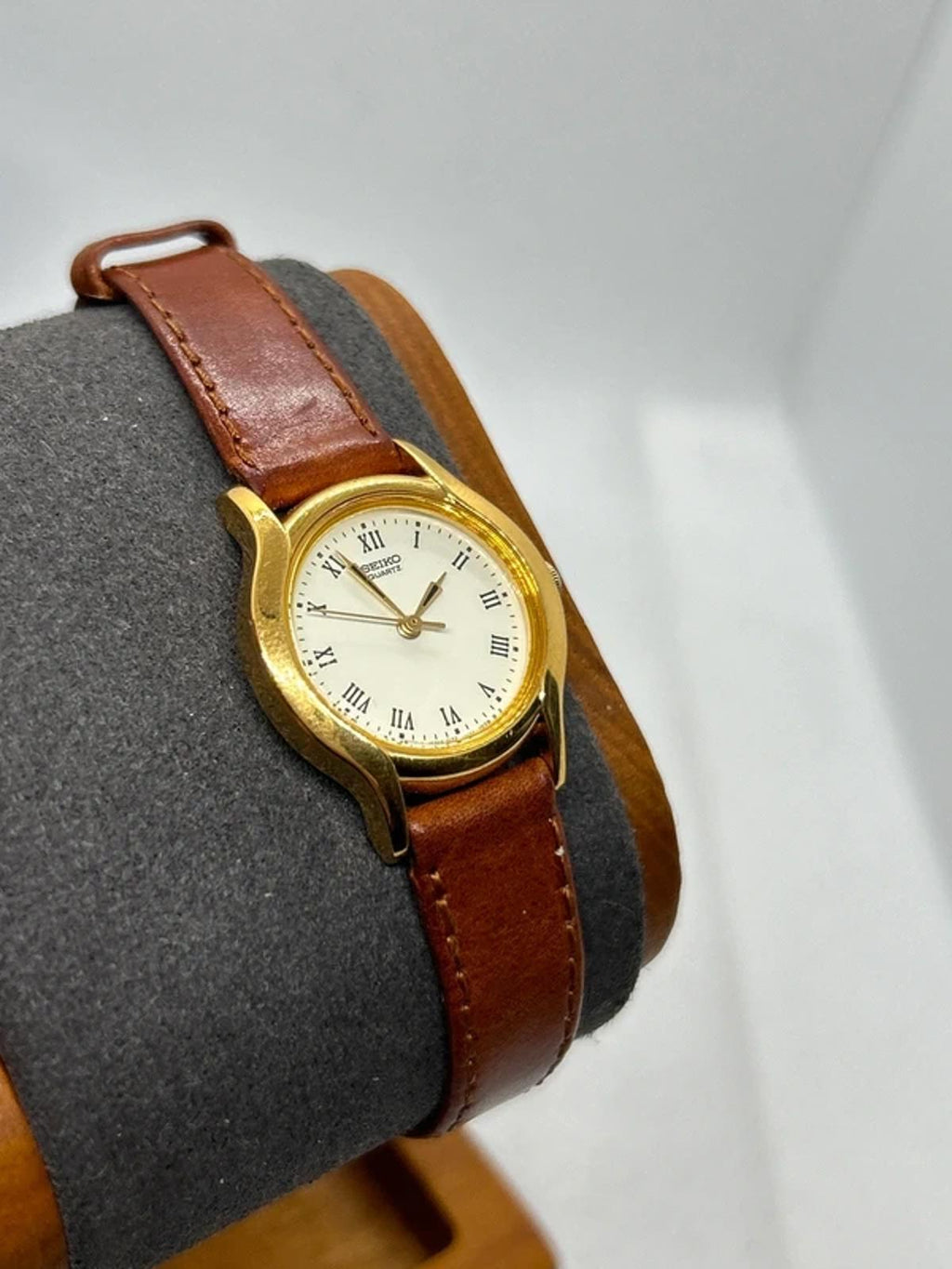 Ladies gold Seiko dress watch with brown leather strap and box