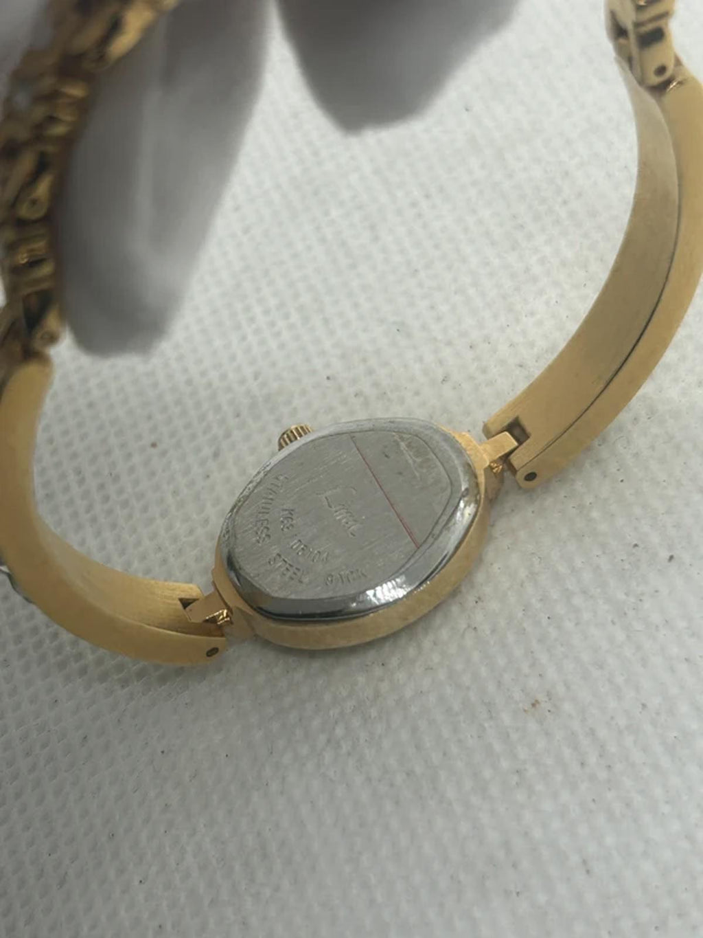 Ladies limit gold cocktail dress watch silver dial with box and papers