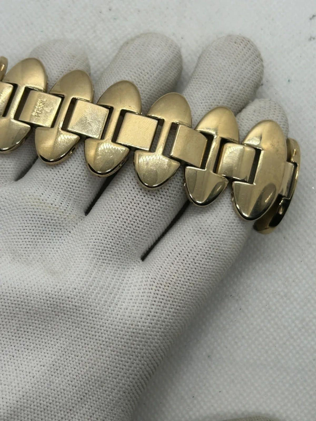 Ladies Fossil gold oval bracelet style watch
