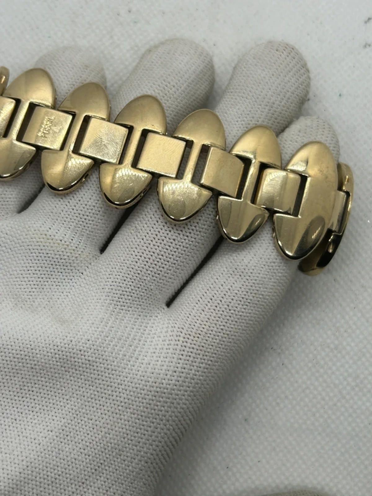 Ladies Fossil gold oval bracelet style watch