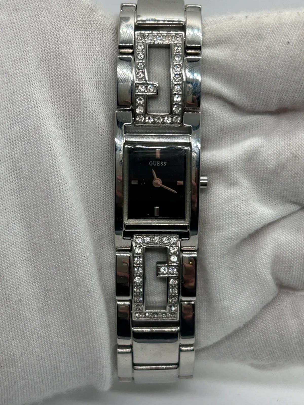 Guess ladies silver tank watch black dial with box and papers