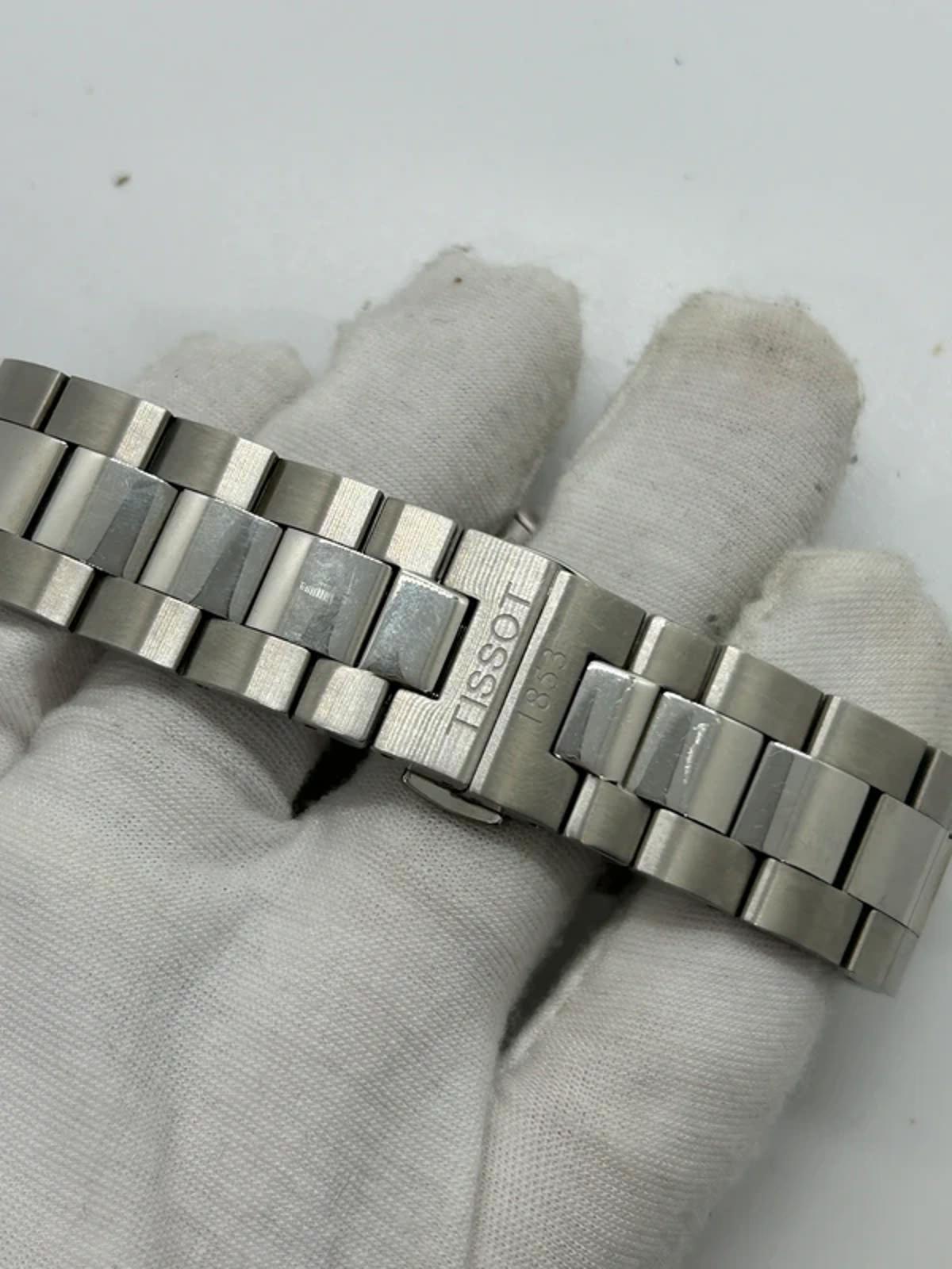 Tissot watch automatic powermatic sunburst blue dial with box and papers