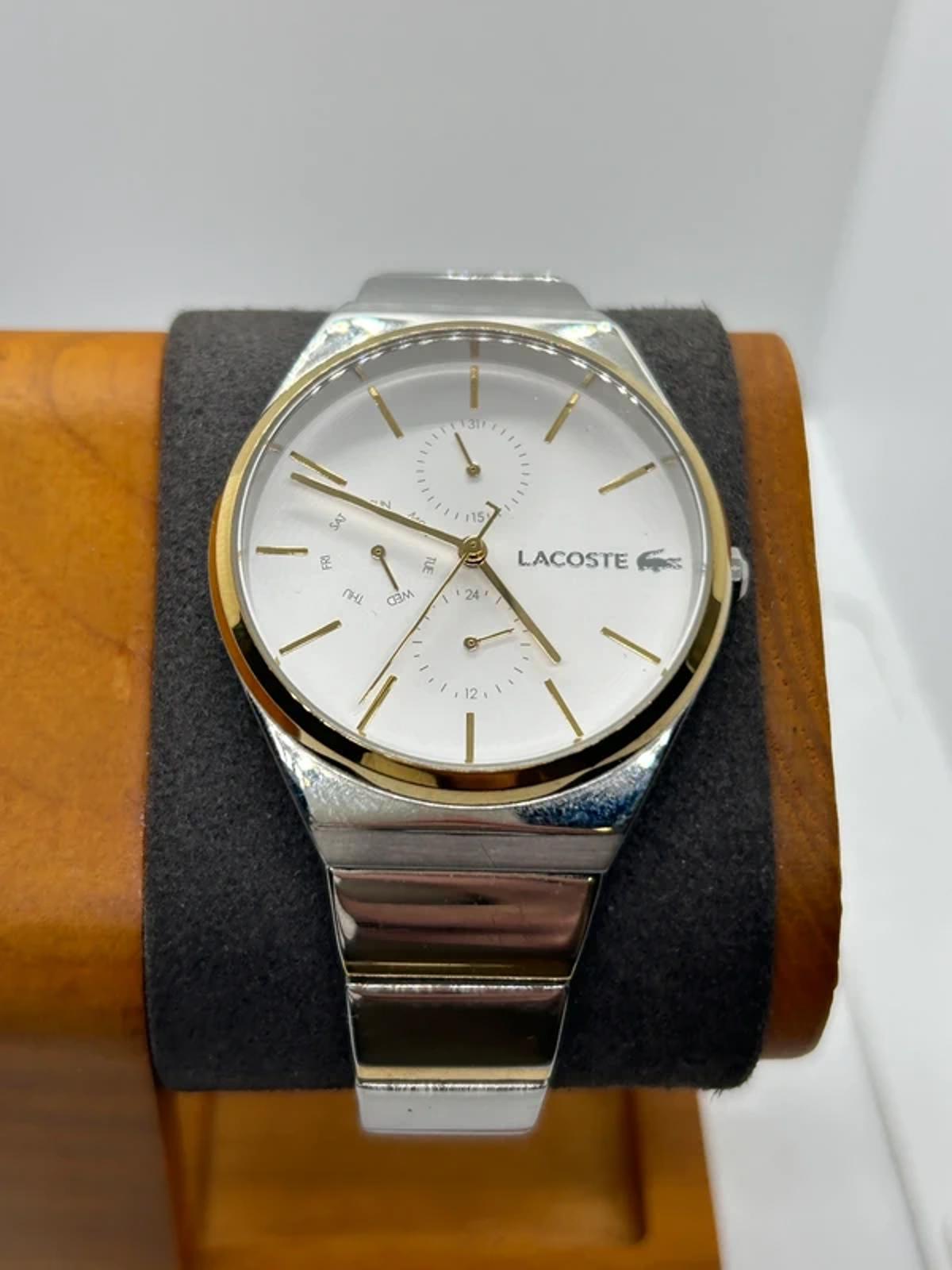 Ladies Lacoste silver and gold watch with box and papers