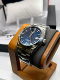 Tissot watch automatic powermatic sunburst blue dial with box and papers