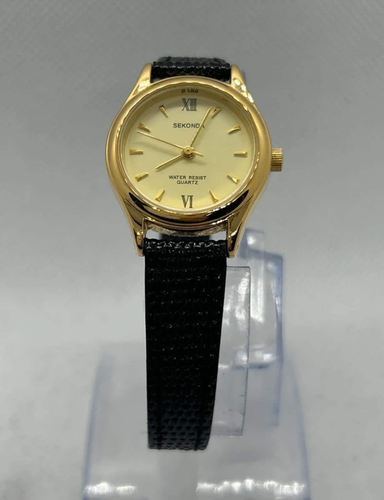 Ladies gold Sekonda case and dial with black strap with box