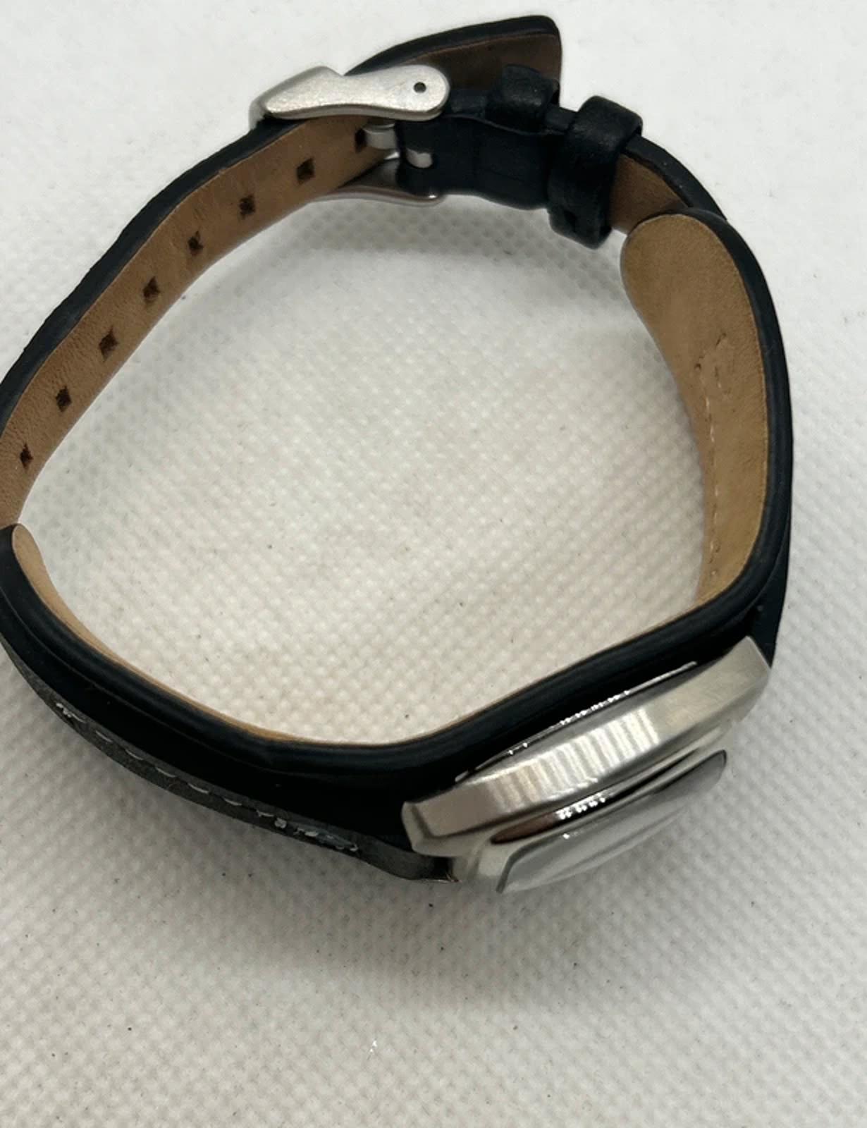 fossil ladies quartz watch on black leather band blue dial silver case
