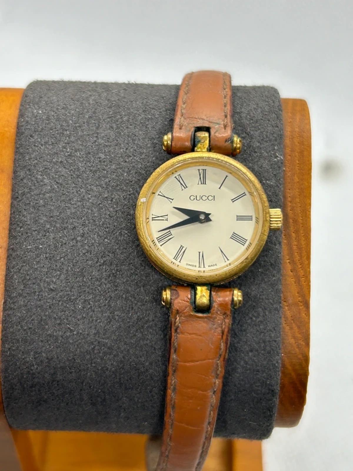 Vintage Gucci ladies watch with gold dial and red green case watch