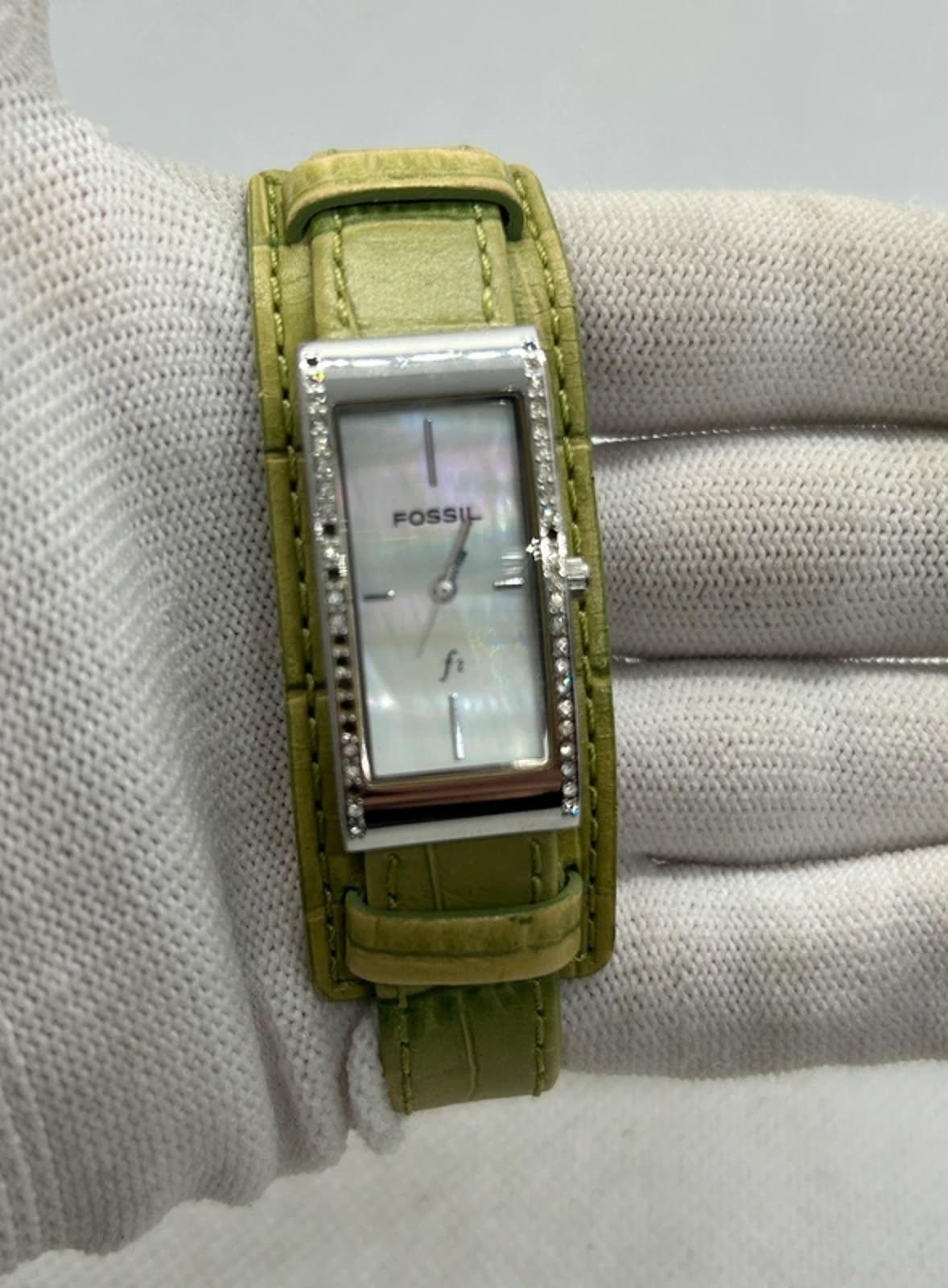 Ladies Fossil silver case watch with olive green strap with watch tin