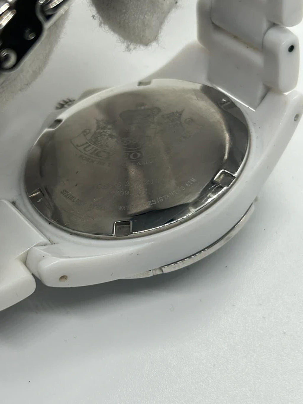 Ladies Juicy couture white plastic watch with diamantés