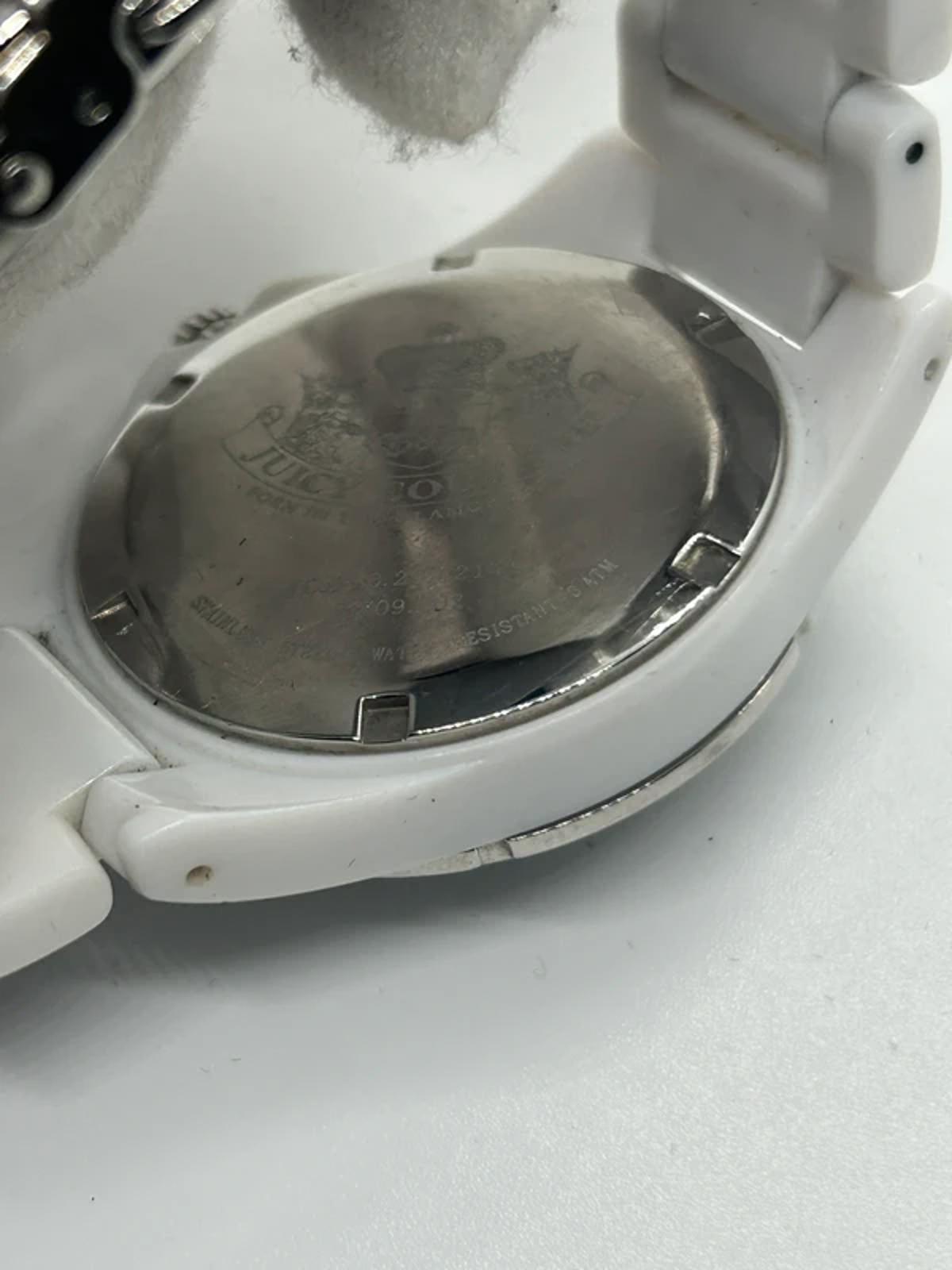 Ladies Juicy couture white plastic watch with diamantés