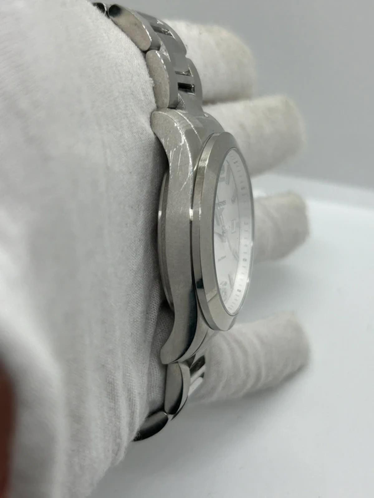 Longines conquest quartz watch  box and manual