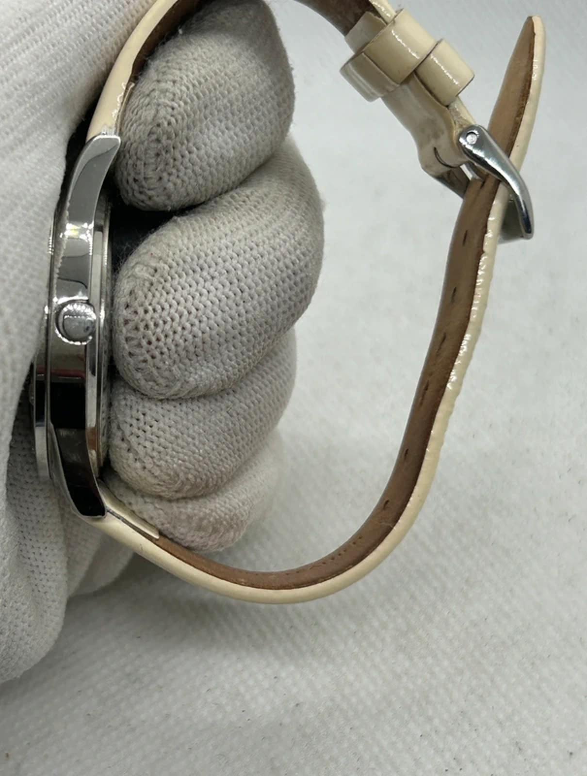 Lovely Ladies Guess silver watch diamanté style bezel with box and papers